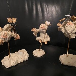 Set of 3 jolly flying Santa’s candlestick holders